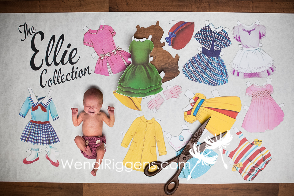 Baby Ellie poses for part of her newborn session as a vintage paper doll!